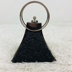 GEM black & silver specled rock circular clasped hand healed party bag